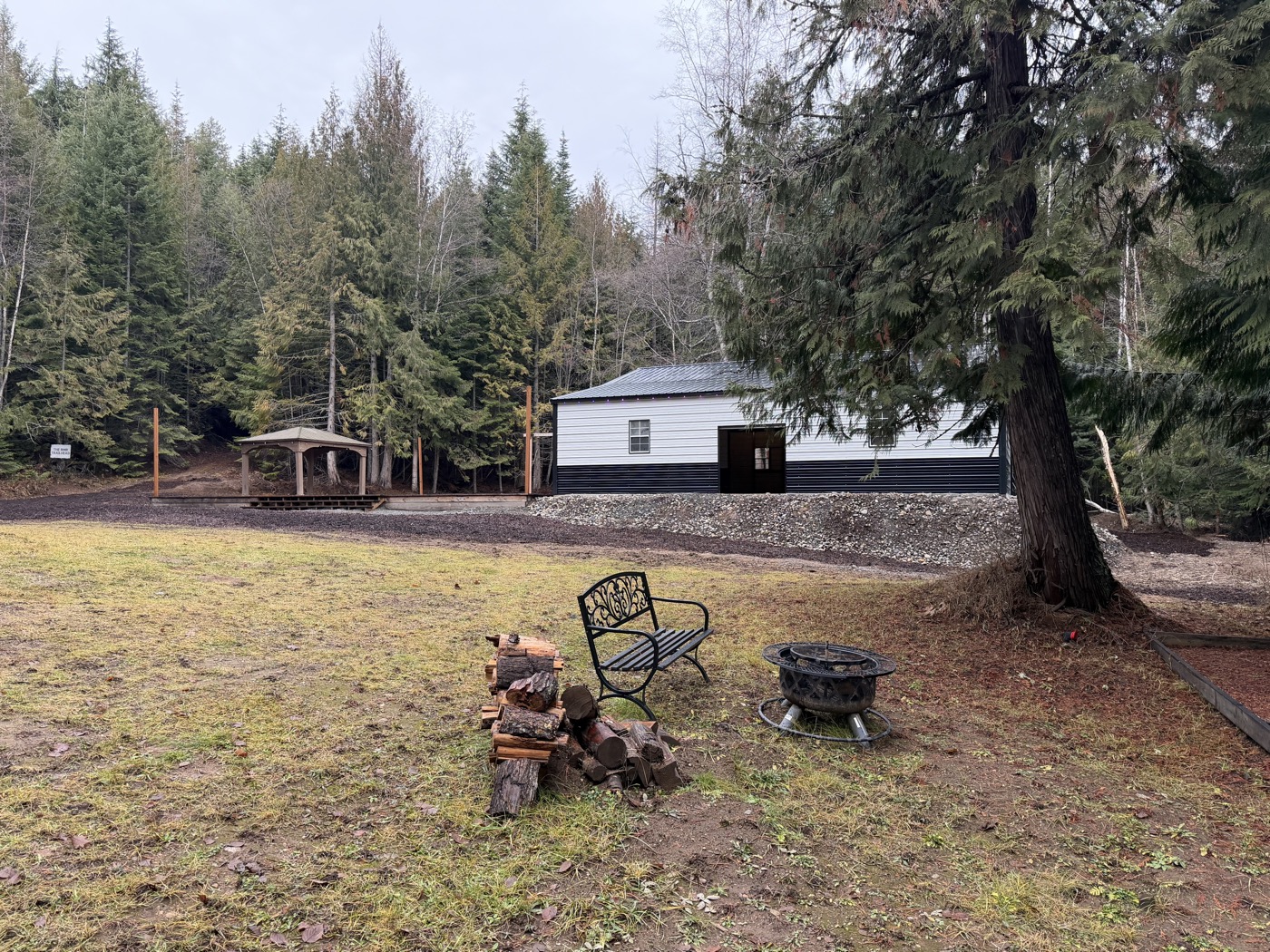 Event center with fire pit and meadow